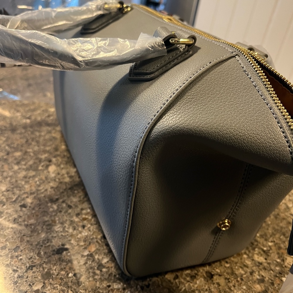 Beautiful brand new Ora Delphine pocketbook. Crossbody straps with handles too!